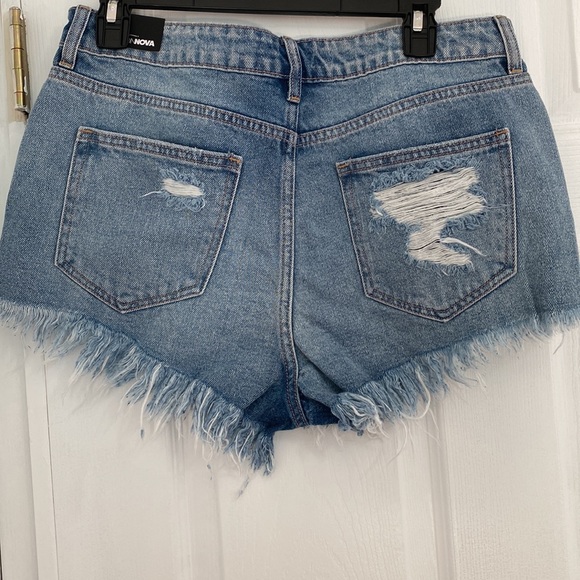 NWT FASHION NOVA HEARTBREAKER DISTRESSED DENIM SHORTS SIZE L - Picture 3 of 6